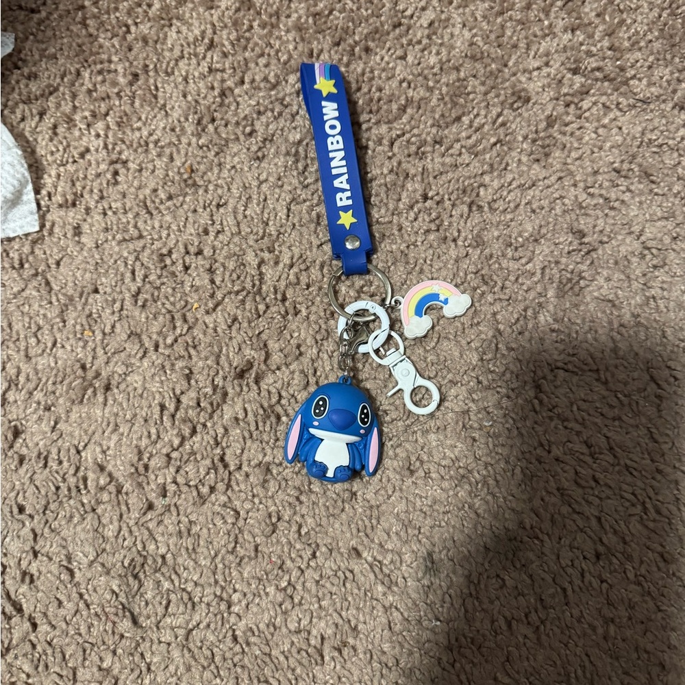 Blue Cartoon stitch knock-off key chain with strap.